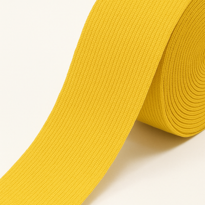Yellow braided elastic band PEL 1006 on a 25 m roll