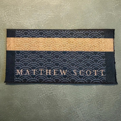 Jacquard woven label LBL 0023 8 x 4 cm – premium wavy design, personalized with logo