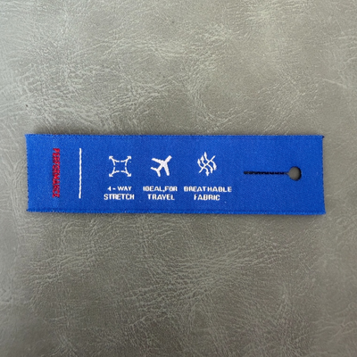 Jacquard woven label LBL 0043 8 x 2 cm – unique design with buttonhole, woven lettering, soft premium style, with logo
