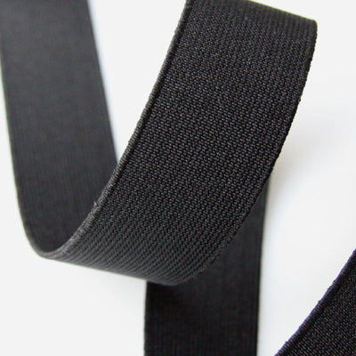 Black flat woven elastic PEL 0002, 25 m roll