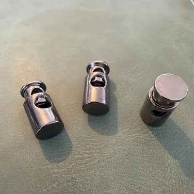Metal cord stopper E-1916 Gun Metal 2 cm – Single hole, Round model