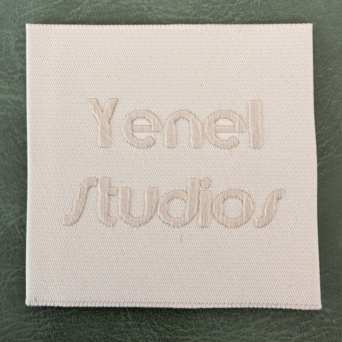 Jacquard label LBL 0032 5x Embossed letters, square – 5 cm