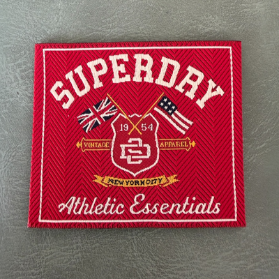 Jacquard woven label LBL 0039 5.5 x 4.5 cm – branded design with woven letters, soft premium style, with logo