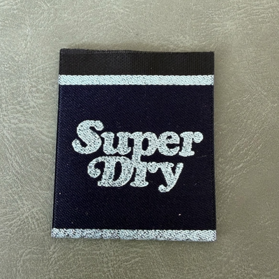 Jacquard woven label LBL 0045 4 x 4 cm – unique design with jacquard lettering, soft premium style, with logo