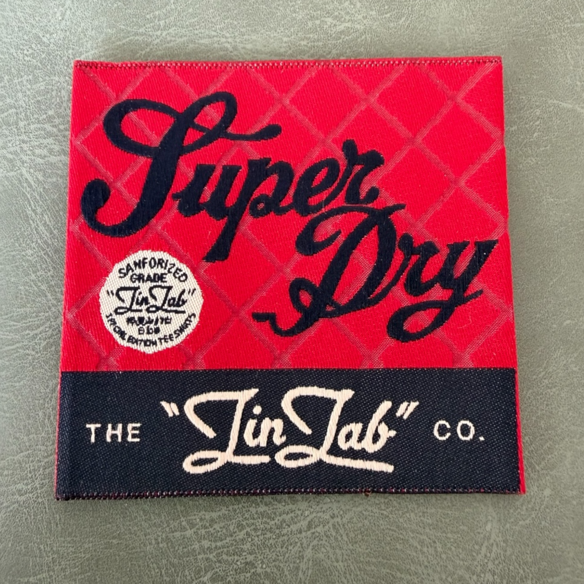 Jacquard woven label LBL 0047 6 x 6 cm – multicolored unique design, woven lettering, soft premium style, with logo