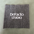 Jacquard woven label LBL 0056 6.5 x 6 cm – grey base with white letters, soft premium design, with logo