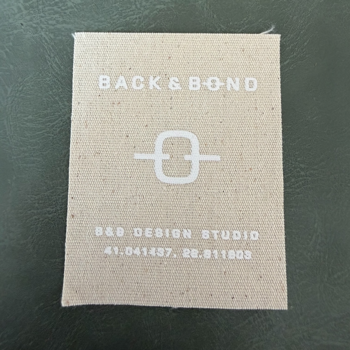 Printed canvas label LBL 0072 6.5 x 5 cm – with white print, soft premium design, with logo