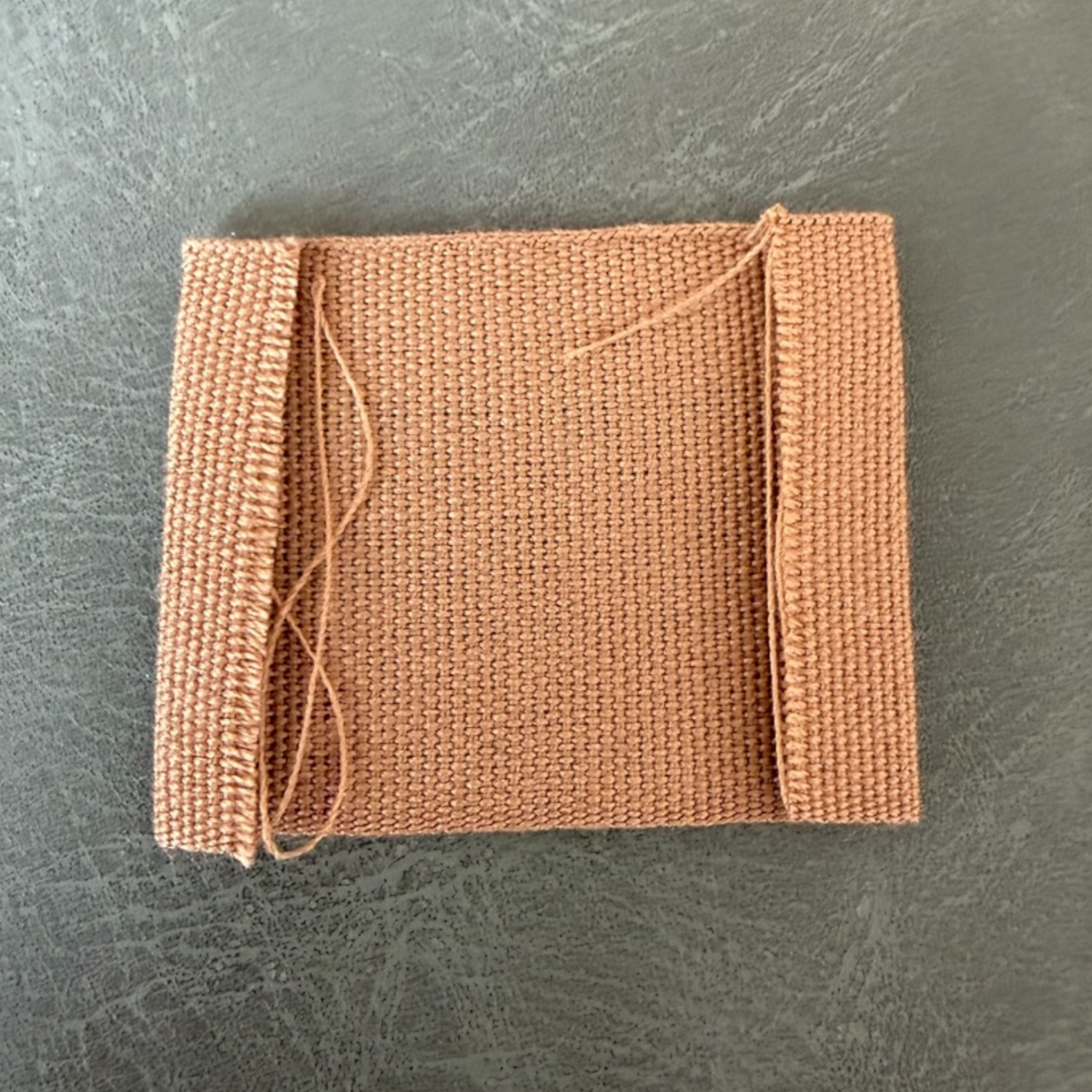 Printed canvas label LBL 0075 4 x 3 cm – brown base with color print, soft premium design, with logo, MOQ 1000 pcs