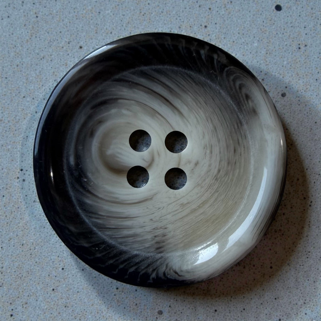 Melange polyester buttons PG 265 Col 10 – glossy grey with a dark pattern