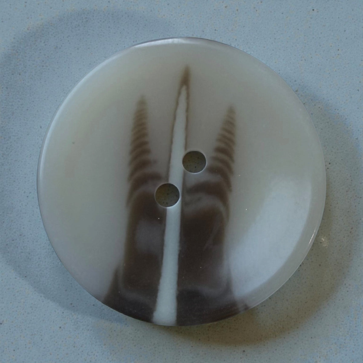 Melange polyester buttons PG 291 Col 7 – shiny beige with a white stripe